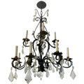 Handcrafted French wrought iron chandelier with cascading crystals