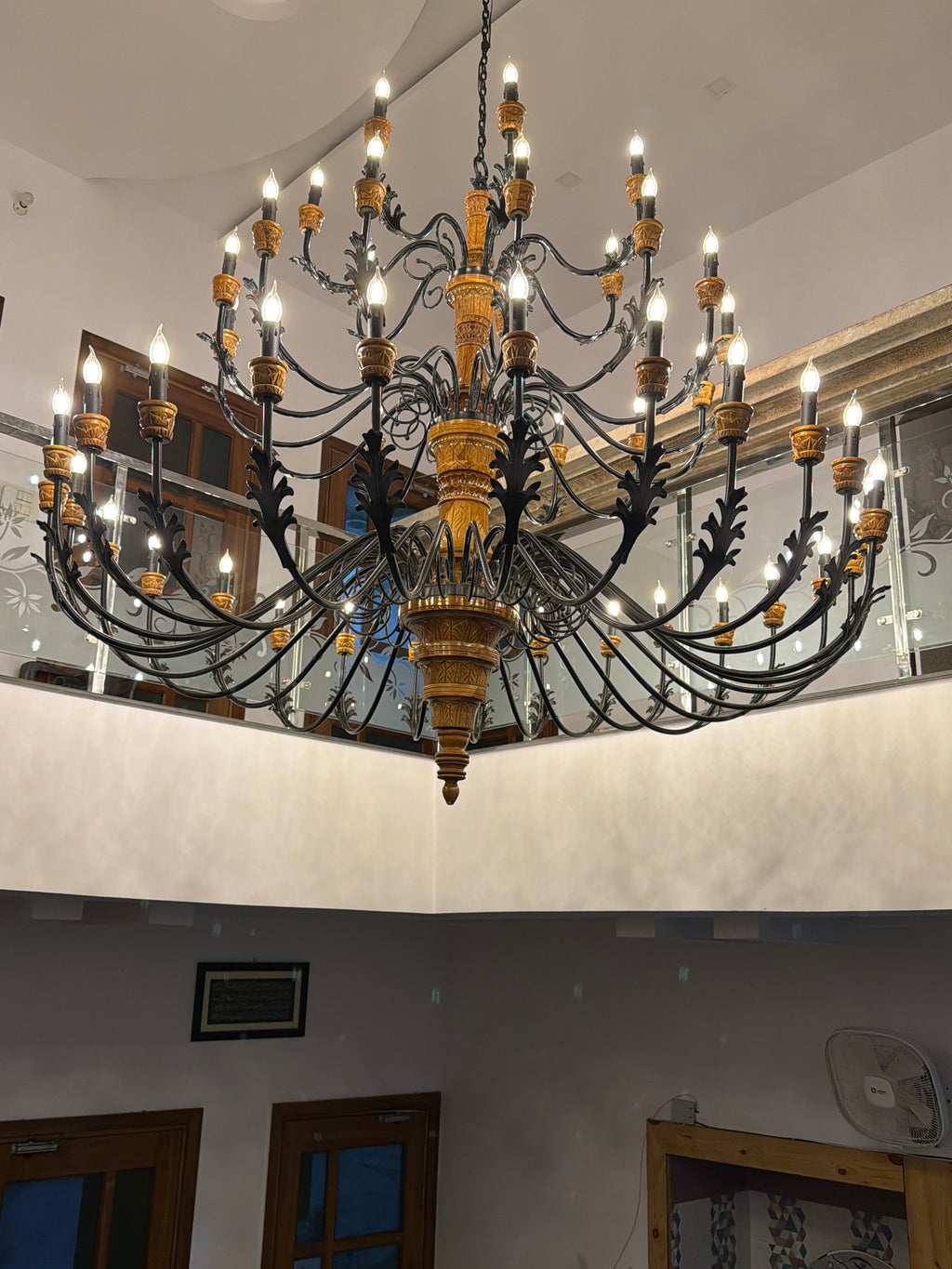 Imperial Bloom handcrafted teak and wrought iron chandelier, 49-light three-tier design